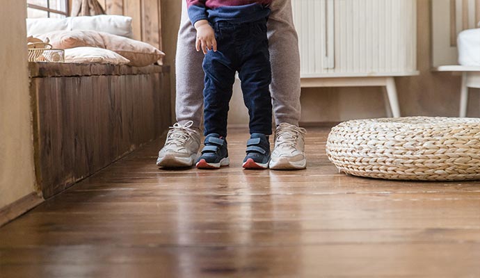 children playing on clean wooden floor