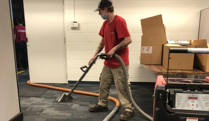 Commercial space cleaning by worker