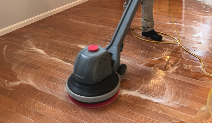 a man providing floor cleaning service