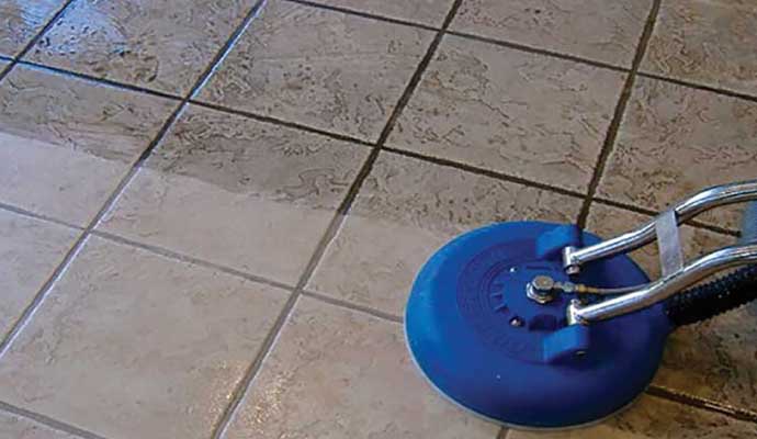 Cleaning dirty tile floor using a professional machine